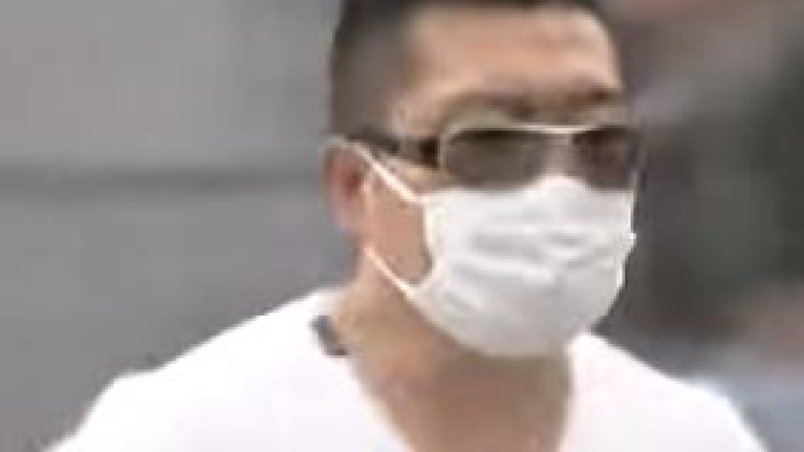 Subject wearing white mask