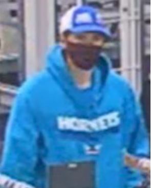 Subject in black mask